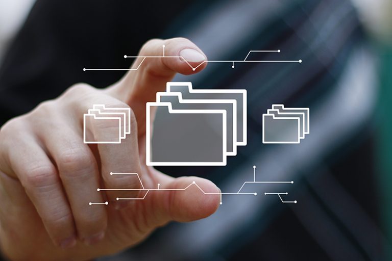 Businessman presses button file